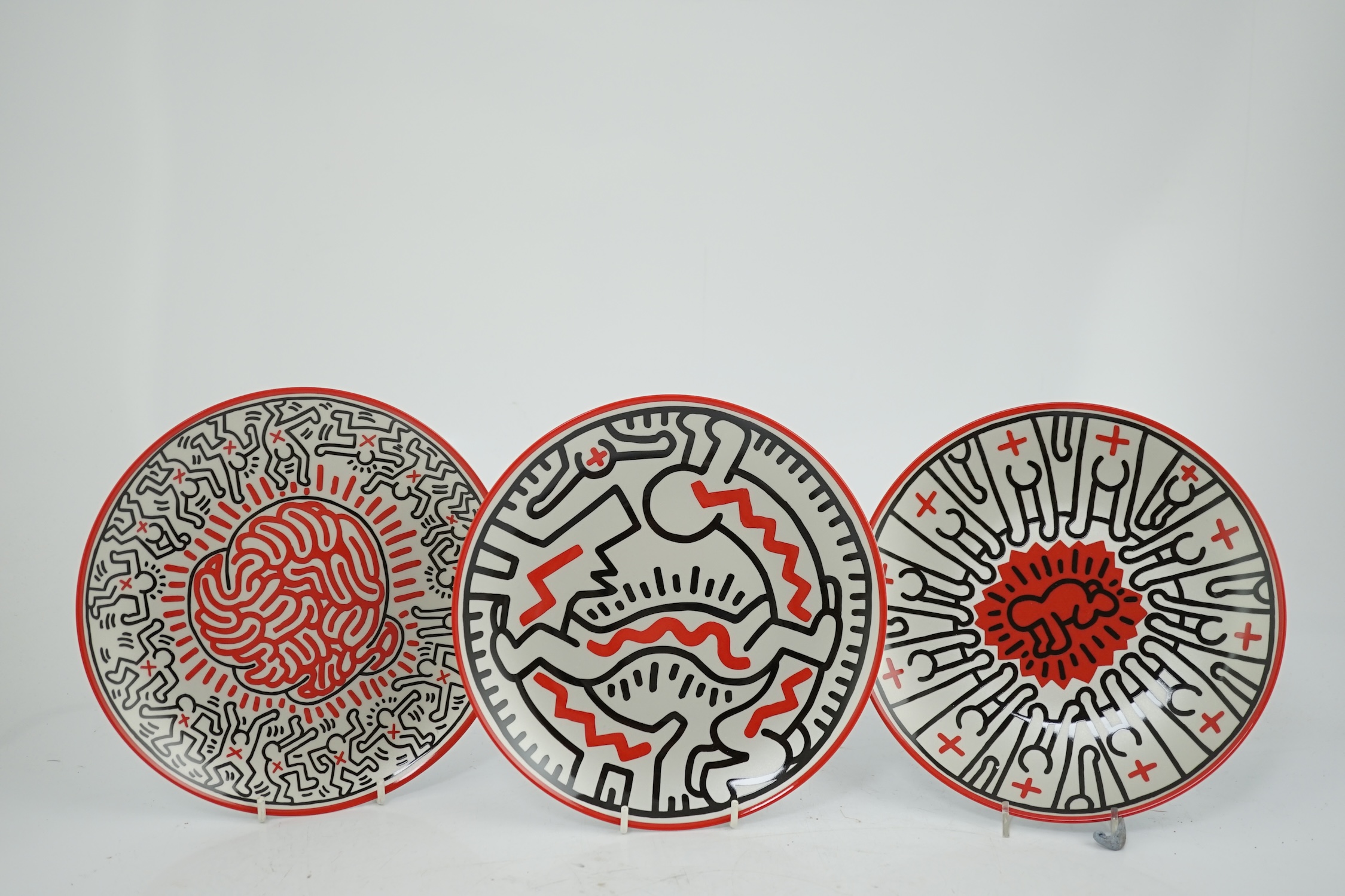 Keith Haring (American, 1958-1990) designs, a set of six Ligne Blanche, Limoges porcelain plates